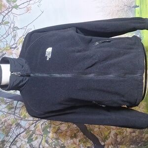 The North Face SP black zip up furry jacket